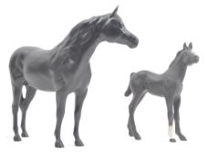 ROYAL DOULTON - TWO MATTE BLACK CERAMIC HORSE FIGURINES