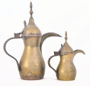 PAIR OF MATCHED VINTAGE BRASS ISLAMIC DALLAH COFFEE POTS