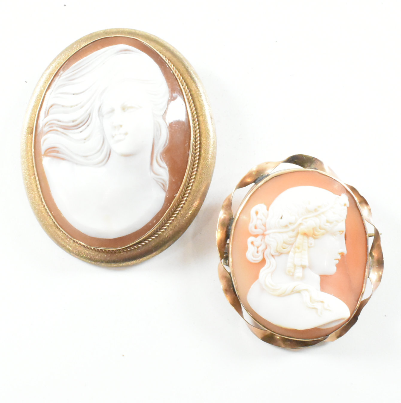 TWO YELLOW METAL CARVED SHELL CAMEO BROOCH PINS