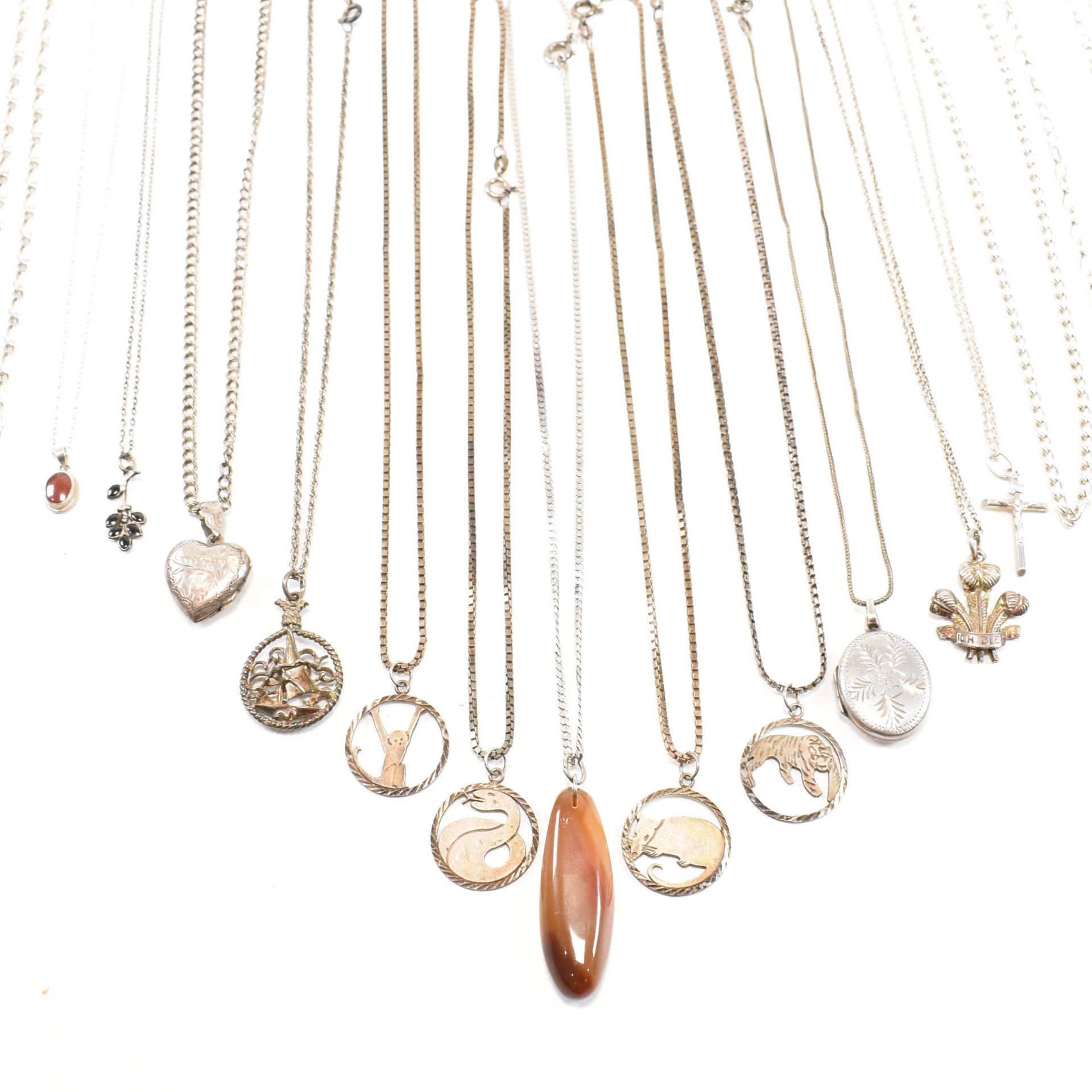 COLLECTION OF SILVER & WHITE METAL PENDANT NECKLACES