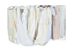 COLLECTION OF VINTAGE THEATRICAL WEDDING STYLE CREAM DRESSES