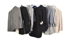 COLLECTION OF EIGHT ASSORTED COSTUME MENSWEAR SUITS