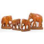 COLLECTION FOUR CARVED FRUITWOOD ELEPHANT FIGURES