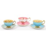 THREE PIECES AYNSLEY ORCHARD GOLD TEACUP & SAUCER