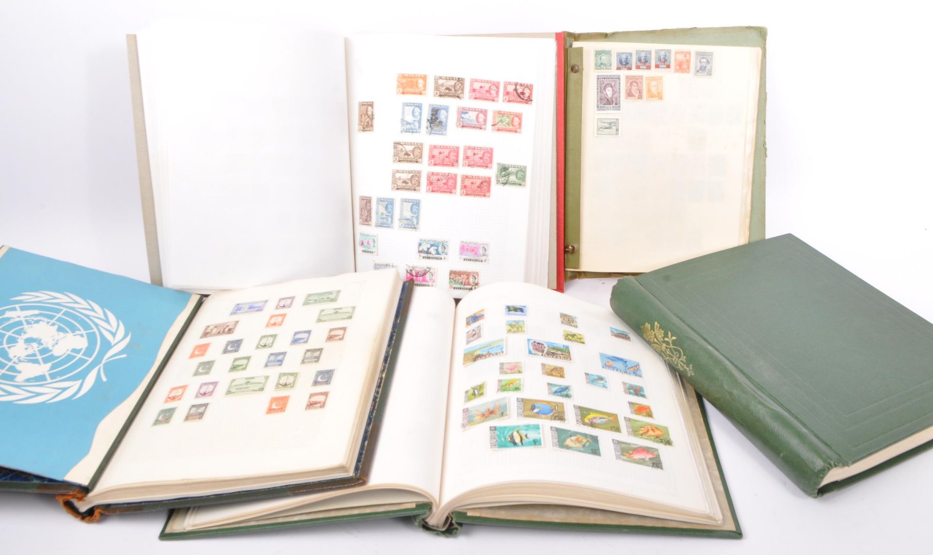 STAMP ALBUMS - COLLECTION OF FIVE ALBUMS OF WORLD STAMPS