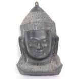 20TH CENTURY CAST EBONISED BRASS BUDDHA WALL FACE MASK