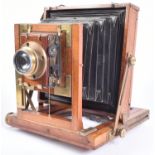 19TH CENTURY MAHOGANY FOLDING BELLOWS CAMERA