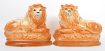 EARLY 20TH CENT MATCHING STAFFORDSHIRE CERAMIC FIRE DOGS/LIONS
