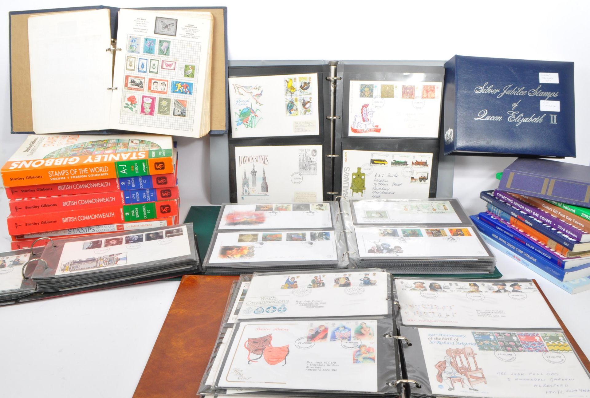 COLLECTION OF UK FIRST DAY COVERS & STAMP REFERENCE BOOKS
