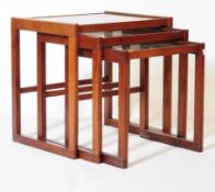 MID 20TH CENTURY SMOKED GLASS TEAK NEST OF TABLES