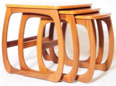 PARKER KNOLL - LATE 20TH CENTURY TEAK NEST OF TABLES
