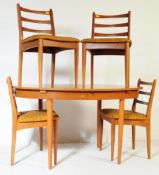 MID 20TH CENTURY TEAK DINING TABLE AND CHAIRS BY SCHREIBER