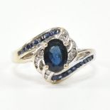 WHITE GOLD SAPPHIRE & DIAMOND CROSSOVER RING