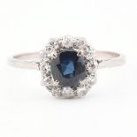 18CT WHITE GOLD SAPPHIRE & DIAMOND HALO RING