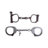 TWO 19TH CENTURY FRENCH HANDCUFFS