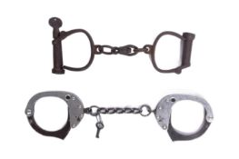 TWO 19TH CENTURY FRENCH HANDCUFFS
