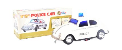 TINPLATE TOYS - VINTAGE TINPLATE BATTERY OPERATED VW POLICE CAR