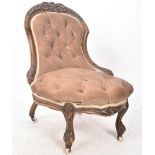 19TH CENTURY HIGH VICTORIAN MAHOGANY NURSING CHAIR