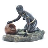 COLD PAINTED BRONZE FIGURE OF KNEELING AFRICAN WOMAN