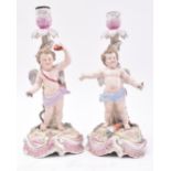 PAIR OF 19TH CENTURY SITZENDORF PORCELAIN PUTTI CANDLESTICKS