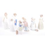 COLLECTION OF NINE PORCELAIN NAO FIGURES BY LLADRO