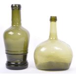 TWO EARLY TO MID 20TH CENTURY LARGE GREEN GLASS BOTTLES