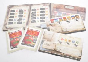 COLLECTION OF UNFRANKED UK HARRY POTTER STAMPS & POSTCARDS