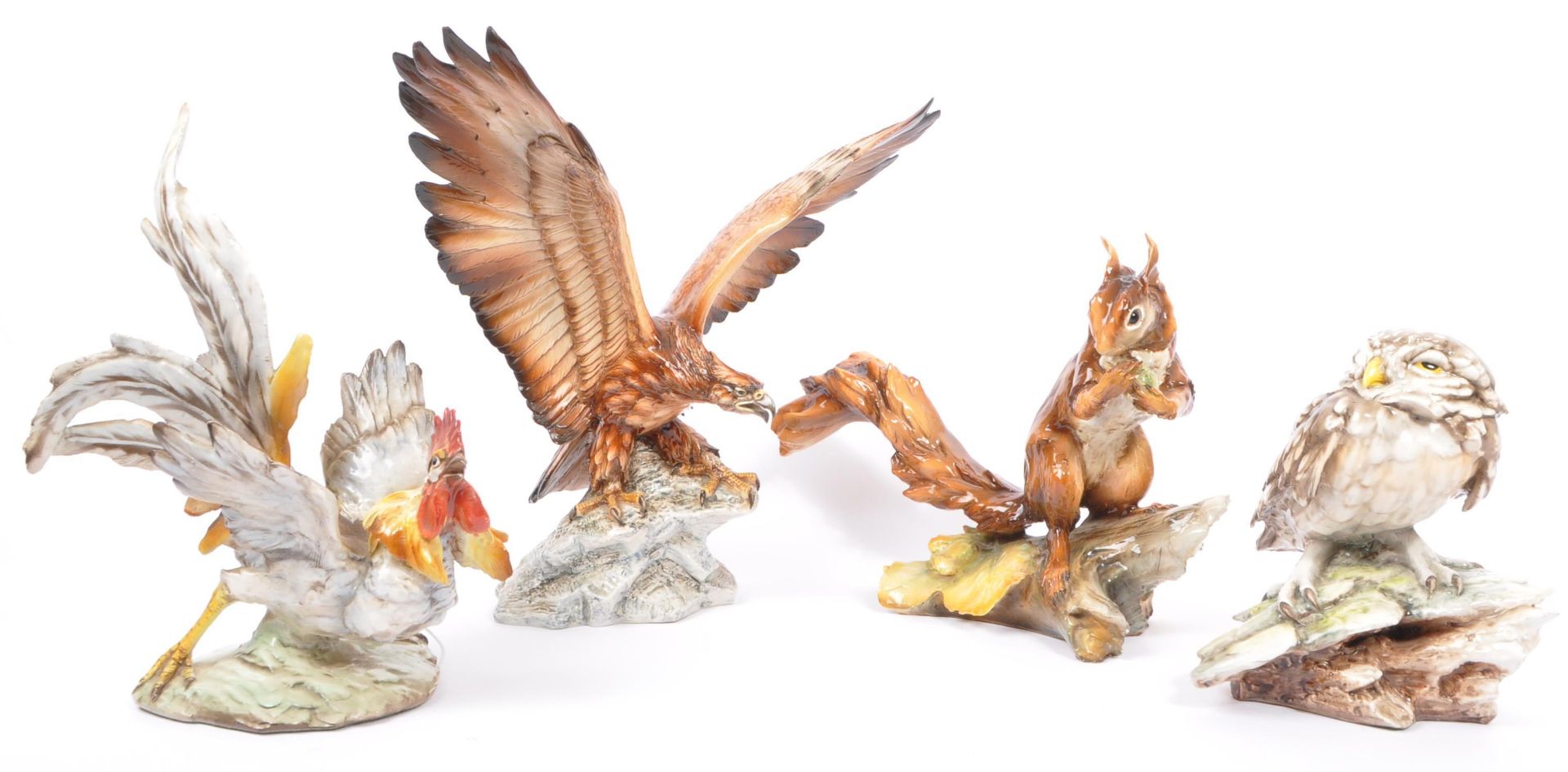 FOUR MID 20TH CENTURY CERAMIC PORCELAIN ANIMAL FIGURINES