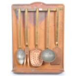 EARLY 20TH CENTURY FRENCH COPPER WALL UTENSIL HOLDER