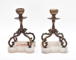 PAIR OF EARLY 20TH CENTURY BRASS & ONYX BASE CANDLESTICKS