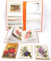 COLLECTION OF EDWARDIAN FLORAL POSTCARDS - TWO ALBUMS
