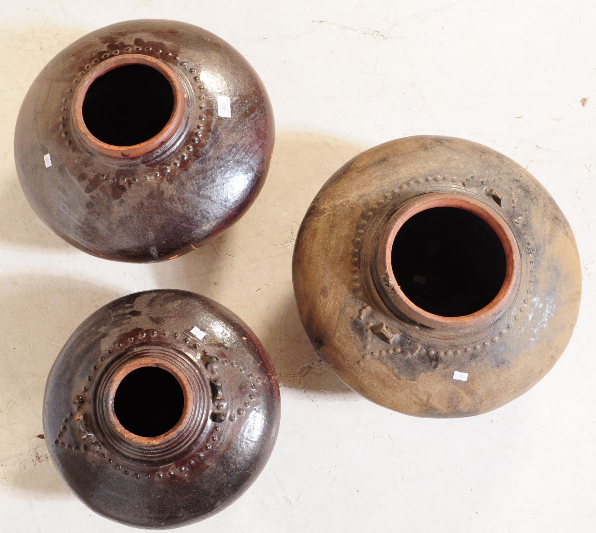 THREE EARLY 20TH CENTURY CHINESE BROWN EARTHENWARE POTS - Image 3 of 4