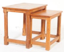 VINTAGE NEST OF TWO TABLES BY ROBERT MOUSEMAN THOMPSON