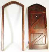 LATE 19TH CENTURY OAK ARCHED CHAPEL DOOR AND FRAME