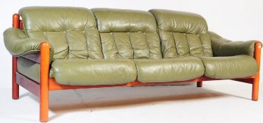 THREE SEATER GREEN LEATHER AND MAHOGANY SOFA SETTEE