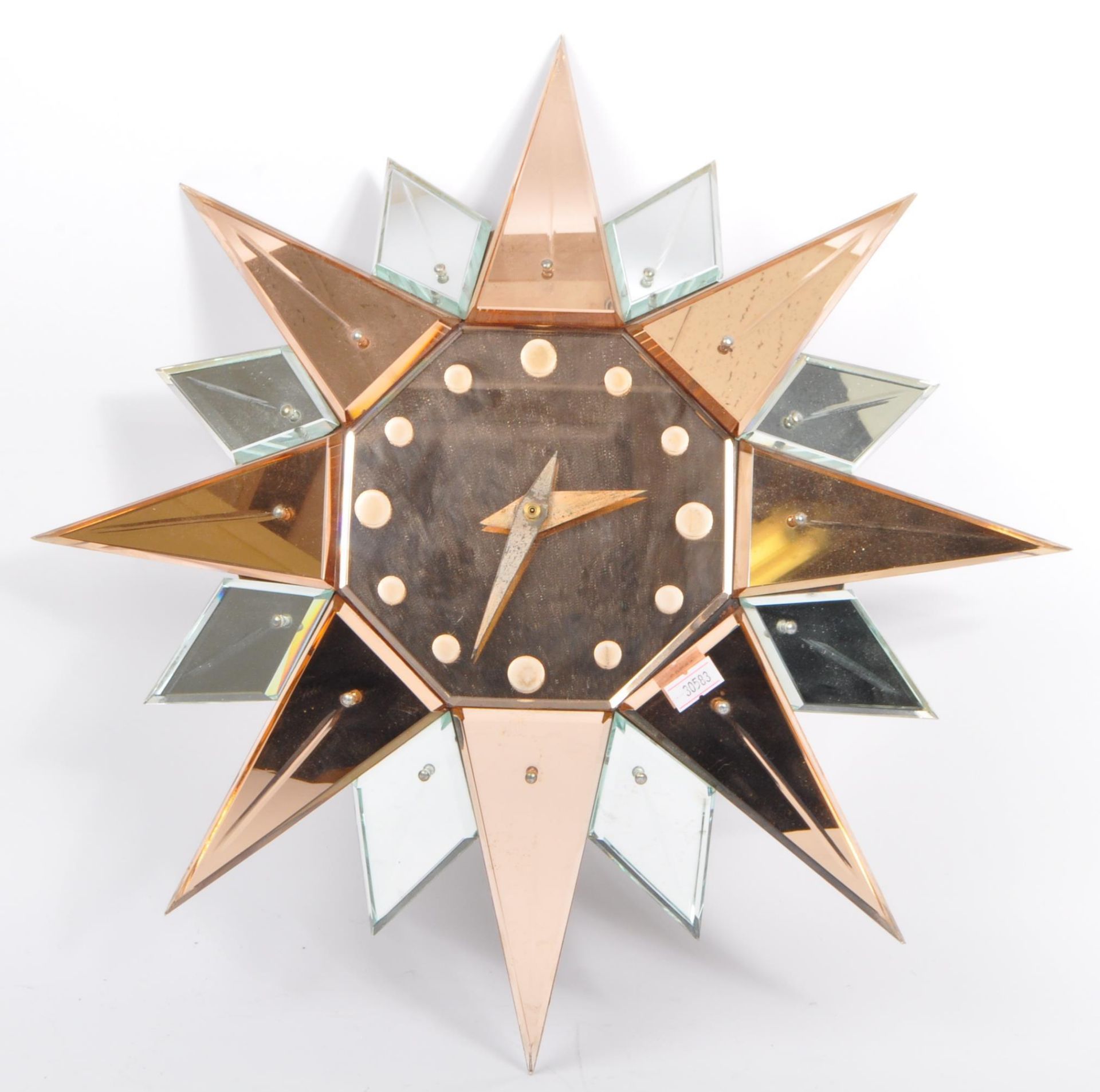 ART DECO GLASS MIRRORED PEACH GLASS STARBURST WALL CLOCK