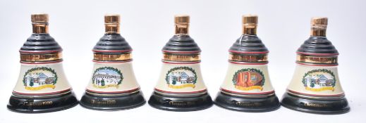 FIVE VINTAGE BELL'S OLD SCOTCH WHISKY CHRISTMAS BELL DECANTERS