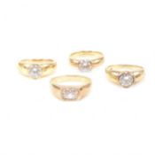 COLLECTION OF FOUR CZ GEM SET RINGS