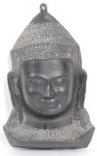 20TH CENTURY CAST EBONISED BRASS BUDDHA WALL FACE MASK