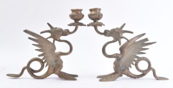 PAIR OF 19TH CENTURY BRASS GRIFFIN CANDLESTICKS