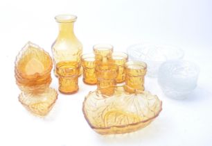 COLLECTION OF AMBER GLASSES, JUG, DESSERT PLATES & BOWLS