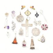 COLLECTION OF ASSORTED SILVER & WHITE METAL NECKLACE PENDANTS