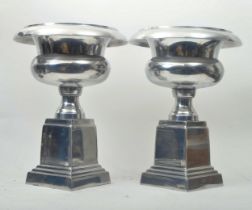 PAIR OF 20TH CENTURY CHROME CAMPANA SHAPED URNS