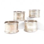 FOUR EARLY 20TH CENTURY HALLMARKED SILVER NAPKIN RINGS