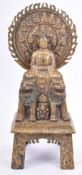 A 20TH CENTURY TANG STYLE BRASS BUDDHA STATUE WITH FU DOGS