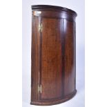 19TH CENTURY GEORGE III BOW FRONT HANGING CUPBOARD