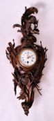 19TH CENTURY CARVED OAK BLACK FOREST WALL CLOCK