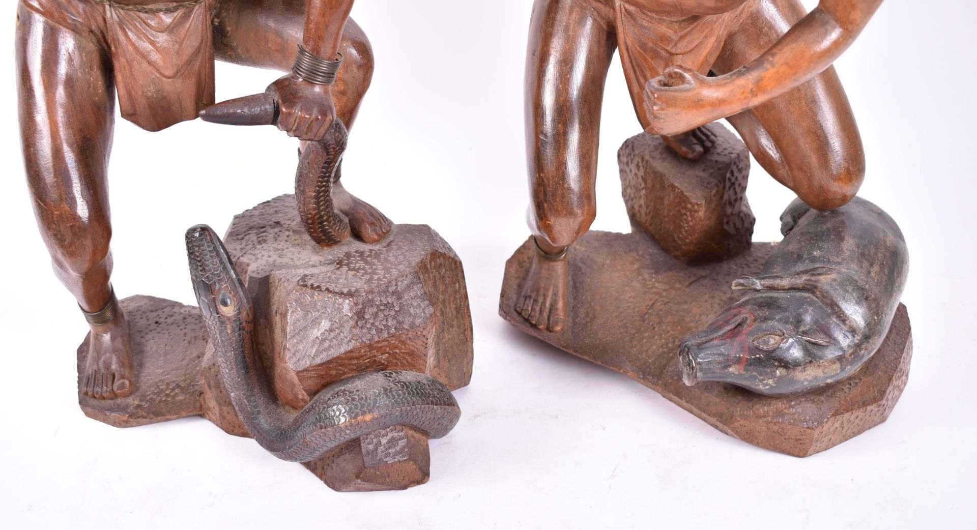 PAIR OF EARLY 20TH CENTURY ORIENTAL CARVED WOOD HUNTERS - Image 4 of 5