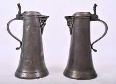 PAIR OF EARLY 18TH CENTURY 1730 SWISS BEARDED MAN FLAGONS