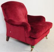 CONTEMPORARY MANNER OF HOWARD OF LONDON ARMCHAIR